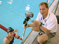 Pete Sczupak and swimmer with video equipment